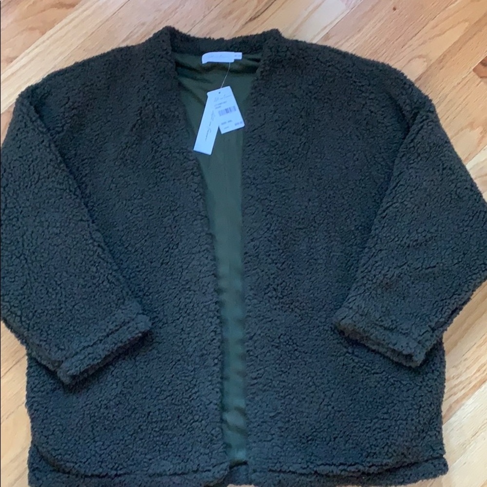 Fully lined with pockets teddy bear jacket.